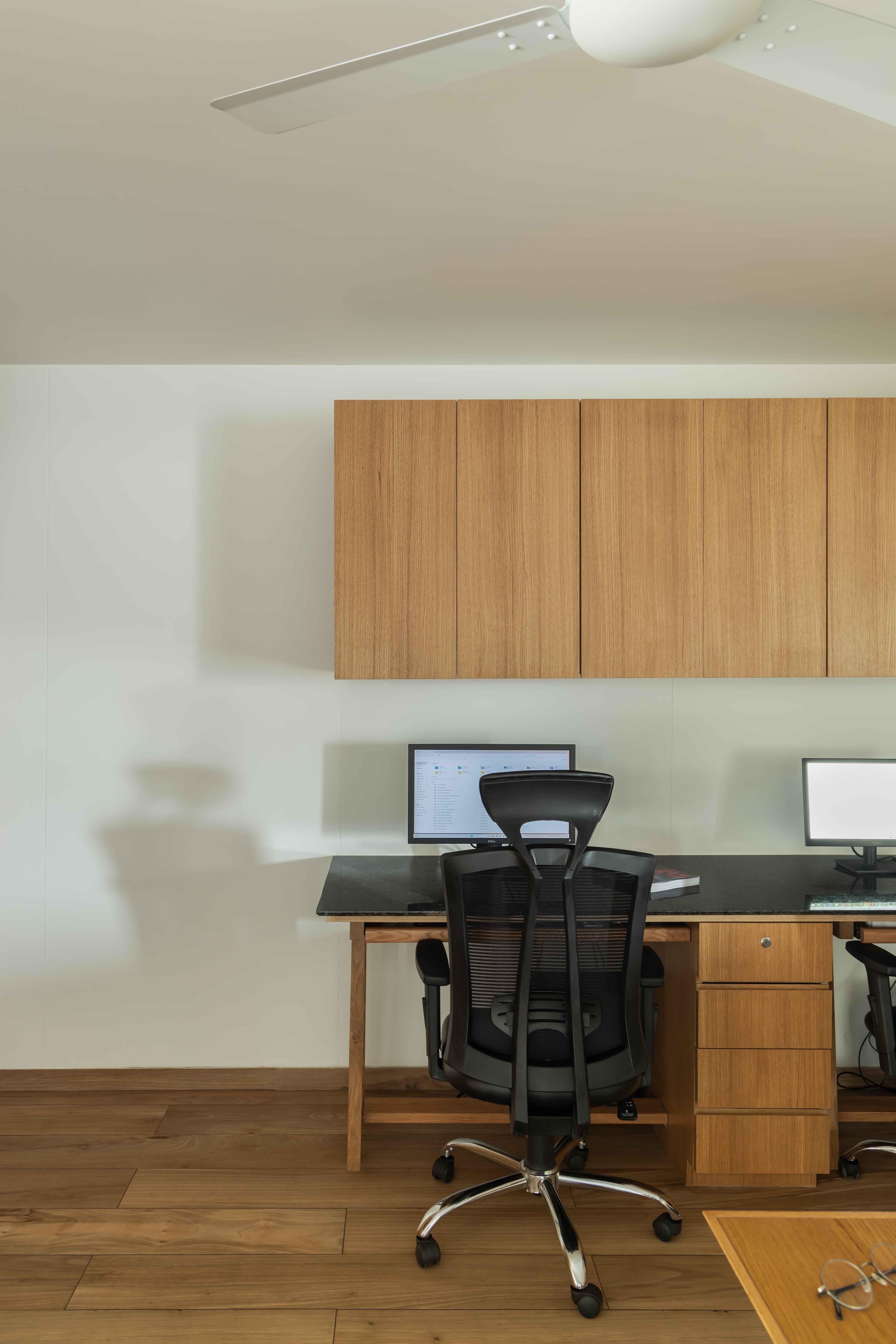 Corner view with wooden cabinetry